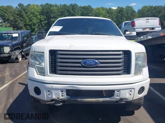 2012 Ford F-150 XL z VIN 1FTFW1EF9CFC87299, wystawiony jako IAAI lot #43103585 z przebiegiem 215 825 mil mil oraz . Historia ofert i sprzedaży dostępna na DreamBid. Obrazek 12.