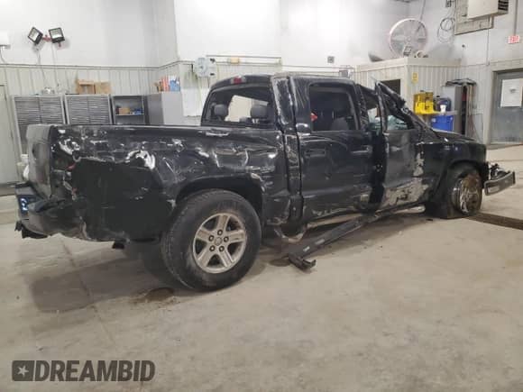 2011 Dodge Dakota с VIN 1D7RE3GP1BS636145, выставлен на аукционе Copart как лот 42037155 с пробегом 161 031 миль миль и Списание • Salvage title. История ставок и продаж доступна на DreamBid. Изображение 3.