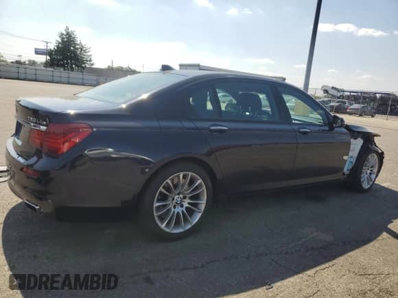 2014 BMW 7 Series ALPINA B7 xDrive z VIN WBAYF8C52ED141978, wystawiony jako Copart lot #71231675 z przebiegiem 75 633 mil mil oraz Szkoda całkowita • Salvage title. Historia ofert i sprzedaży dostępna na DreamBid. Obrazek 3.