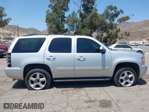 2012 Chevrolet Tahoe LT with VIN 1GNSCBE06CR255554, listed as a IAAI auction lot 42544690 with 136,070 mi miles and . Bid and sale history available at DreamBid. Image 13.