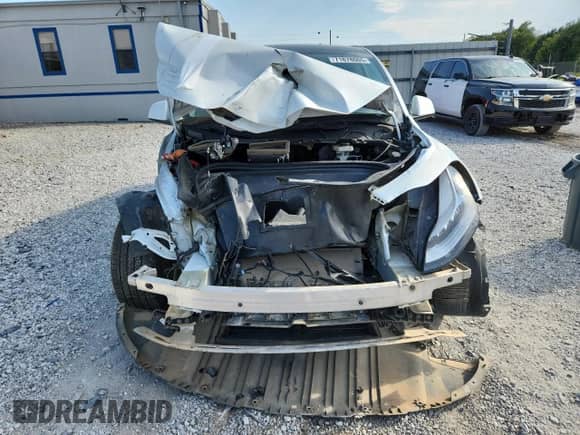 2021 Tesla Model Y Long Range with VIN 5YJYGDEE9MF099385, listed as a Copart auction lot 71878605 with Not provided miles and Salvage title. Bid and sale history available at DreamBid. Image 5.