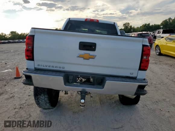 2017 Chevrolet Silverado 1500 LT with VIN 3GCPCREH7HG232224, listed as a Copart auction lot 84614215 with 104,344 mi miles and Salvage title. Bid and sale history available at DreamBid. Image 6.