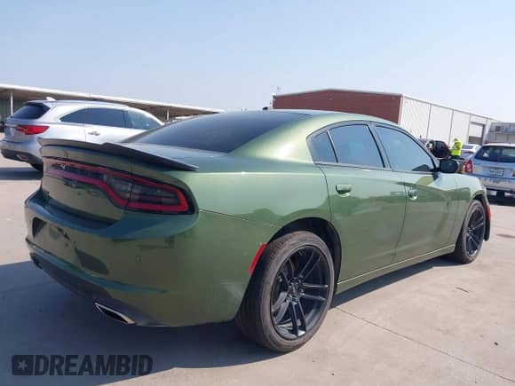 2021 Dodge Charger SXT with VIN 2C3CDXBG7MH544893, listed as a IAAI auction lot 42897509 with 75,146 mi miles and . Bid and sale history available at DreamBid. Image 4.