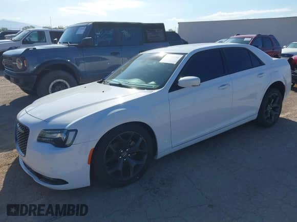2023 Chrysler 300 S with VIN 2C3CCABG6PH573192, listed as a IAAI auction lot 43288111 with 24,584 mi miles and . Bid and sale history available at DreamBid. Image 2.