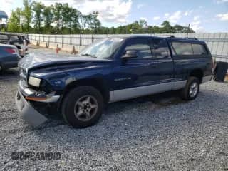 2000 Dodge Dakota Sport with VIN 1B7GL22N9YS589138, listed as a Copart auction lot 55923555 with 238,289 mi miles and Salvage title. Bid and sale history available at DreamBid. Image 1.
