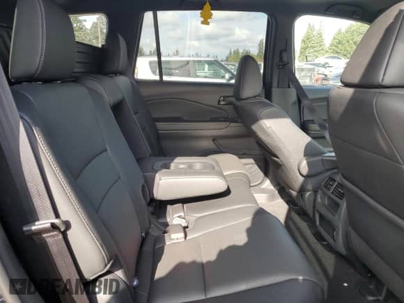 2023 Honda Passport EX-L with VIN 5FNYF8H53PB026202, listed as a Copart auction lot 82571405 with 45,325 mi miles and Salvage title. Bid and sale history available at DreamBid. Image 11.