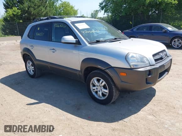 2007 Hyundai Tucson SE z VIN KM8JN12D67U617056, wystawiony jako IAAI lot #42664255 z przebiegiem 123 340 mil mil oraz . Historia ofert i sprzedaży dostępna na DreamBid. Obrazek 1.