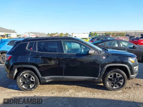2018 Jeep Compass Trailhawk z VIN 3C4NJDDB4JT231283, wystawiony jako IAAI lot #43371219 z przebiegiem 134 712 mil mil oraz . Historia ofert i sprzedaży dostępna na DreamBid. Obrazek 13.