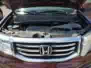 2015 Honda Pilot Touring z VIN 5FNYF4H92FB052669, wystawiony jako Copart lot #60621365 z przebiegiem 77 771 mil mil oraz Czysty tytuł • Clean title. Historia ofert i sprzedaży dostępna na DreamBid. Obrazek 12.