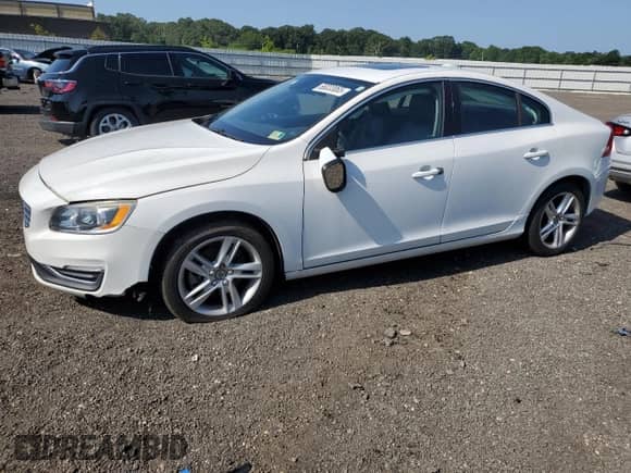 2015 Volvo S60 T5 Drive-E Premier with VIN YV126MFK1F1361158, listed as a Copart auction lot 66033065 with 82,623 mi miles and Clean title. Bid and sale history available at DreamBid. Image 1.