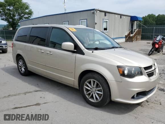 2014 Dodge Grand Caravan R/T with VIN 2C4RDGEG1ER202921, listed as a Copart auction lot 62523525 with 96,045 mi miles and Salvage title. Bid and sale history available at DreamBid. Image 4.