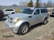 2011 Dodge Nitro SXT z VIN 1D4PU5GK9BW575899, wystawiony jako Copart lot #50897745 z przebiegiem 179 142 mil mil oraz Czysty tytuł • Clean title. Historia ofert i sprzedaży dostępna na DreamBid. Obrazek 1.