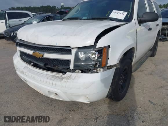 2013 Chevrolet Tahoe Commercial with VIN 1GNLC2E02DR311625, listed as a IAAI auction lot 42727642 with 158,335 mi miles and . Bid and sale history available at DreamBid. Image 6.