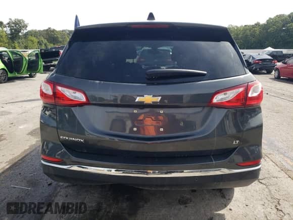 2020 Chevrolet Equinox LT с VIN 2GNAXKEV4L6276295, выставлен на аукционе Copart как лот 70541835 с пробегом 70 261 миль миль и Списание • Salvage title. История ставок и продаж доступна на DreamBid. Изображение 6.