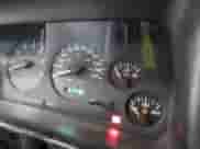 1996 Jeep Grand Cherokee Laredo z VIN 1J4GZ58S5TC293897, wystawiony jako IAAI lot #42435233 z przebiegiem 167 432 mil mil oraz . Historia ofert i sprzedaży dostępna na DreamBid. Obrazek 7.