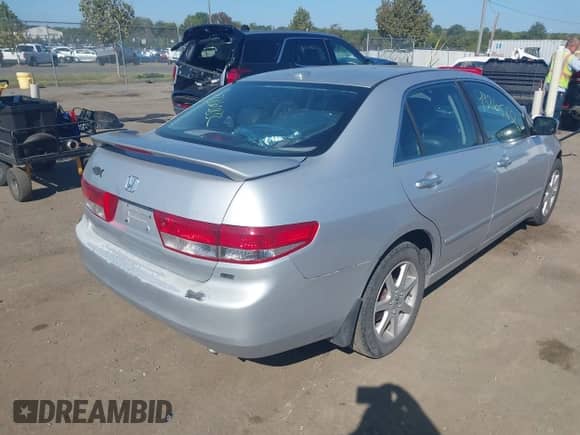 2004 Honda Accord EX with VIN 1HGCM66854A011661, listed as a IAAI auction lot 43265832 with Not provided miles and . Bid and sale history available at DreamBid. Image 4.