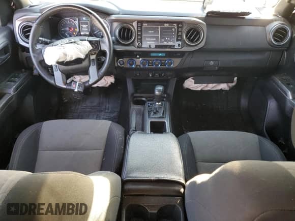 2021 Toyota Tacoma SR with VIN 3TMCZ5AN1MM425739, listed as a Copart auction lot 84917565 with 77,559 mi miles and Clean title. Bid and sale history available at DreamBid. Image 8.