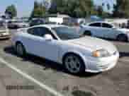 2004 Hyundai Tiburon GT с VIN KMHHN65FX4U134688, выставлен на аукционе Copart как лот 68931044 с пробегом 30 107 миль миль и Списание • Salvage title. История ставок и продаж доступна на DreamBid. Изображение 4.