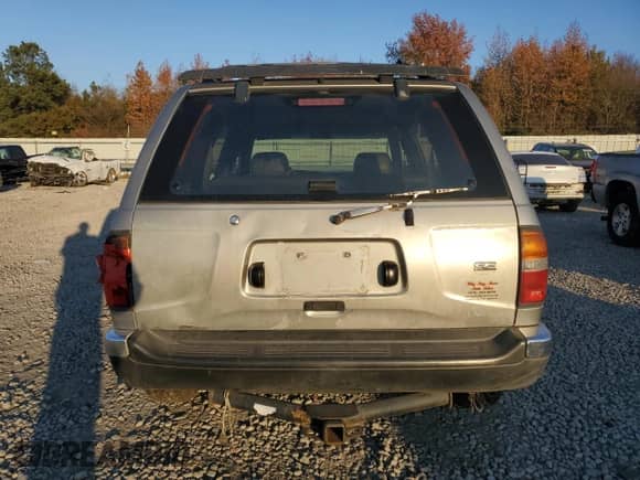 1999 Nissan Pathfinder XE with VIN JN8AR05Y4XW317915, listed as a Copart auction lot 82496174 with 301,862 mi miles and Salvage title. Bid and sale history available at DreamBid. Image 6.