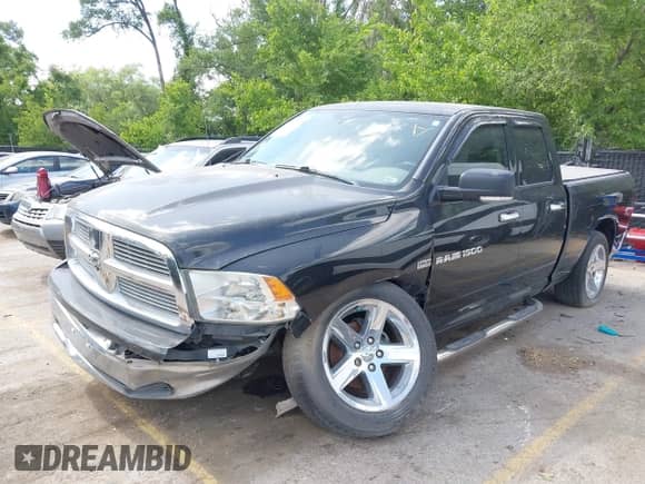 2011 Ram 1500 SLT with VIN 1D7RV1GT2BS548769, listed as a IAAI auction lot 40179300 with Not provided miles and . Bid and sale history available at DreamBid. Image 2.