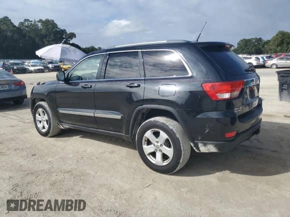 2011 Jeep Grand Cherokee 70th Anniversary z VIN 1J4RR4GG3BC504917, wystawiony jako Copart lot #82192465 z przebiegiem 212 805 mil mil oraz Czysty tytuł • Clean title. Historia ofert i sprzedaży dostępna na DreamBid. Obrazek 2.