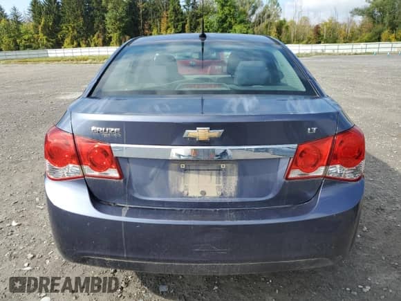 2014 Chevrolet Cruze 1LT with VIN 1G1PC5SB0E7413951, listed as a Copart auction lot 83855695 with 164,407 mi miles and Salvage title. Bid and sale history available at DreamBid. Image 6.