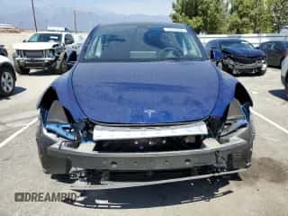 2023 Tesla Model Y Long Range with VIN 7SAYGDEE7PF833979, listed as a Copart auction lot 71277784 with 15,513 mi miles and Salvage title. Bid and sale history available at DreamBid. Image 5.