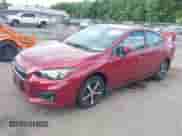 2019 Subaru Impreza Premium with VIN 4S3GKAC60K3609069, listed as a IAAI auction lot 42755337 with 90,437 mi miles and . Bid and sale history available at DreamBid. Image 2.