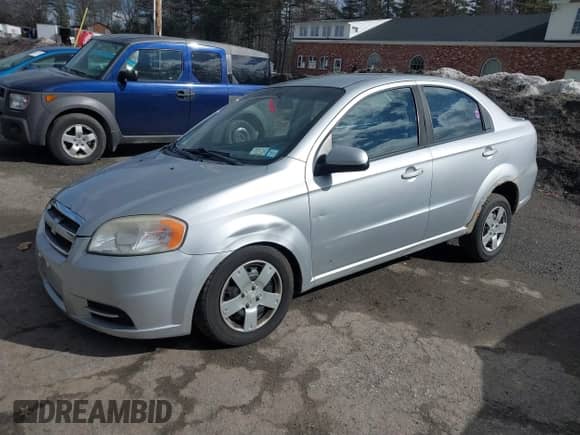 2011 Chevrolet Aveo 1LT with VIN KL1TD5DE6BB215854, listed as a IAAI auction lot 41681408 with 141,848 mi miles and . Bid and sale history available at DreamBid. Image 2.