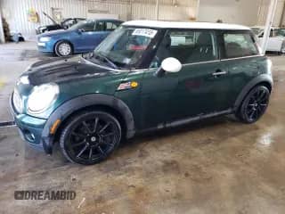 2007 MINI Hardtop with VIN WMWMF33527TL78822, listed as a Copart auction lot 66017415 with 89,577 mi miles and Salvage title. Bid and sale history available at DreamBid. Image 1.