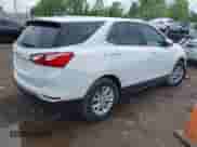 2021 Chevrolet Equinox LT with VIN 3GNAXJEV1MS122656, listed as a IAAI auction lot 42238927 with 91,896 mi miles and . Bid and sale history available at DreamBid. Image 4.