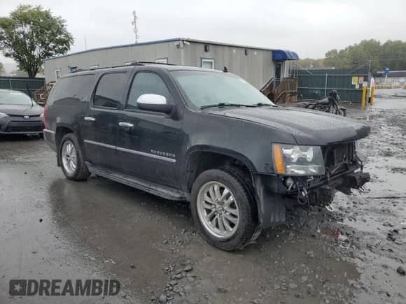 2012 Chevrolet Suburban LTZ z VIN 1GNSKKE74CR234444, wystawiony jako Copart lot #85596655 z przebiegiem 223 614 mil mil oraz Szkoda całkowita • Salvage title. Historia ofert i sprzedaży dostępna na DreamBid. Obrazek 4.
