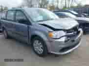 2014 Dodge Grand Caravan SE with VIN 2C4RDGBG1ER376587, listed as a IAAI auction lot 43446338 with 89,380 mi miles and . Bid and sale history available at DreamBid. Image 1.