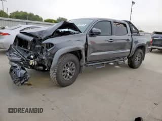 2022 Toyota Tacoma SR5 with VIN 3TMAZ5CN7NM178216, listed as a Copart auction lot 70889745 with 51,289 mi miles and Salvage title. Bid and sale history available at DreamBid. Image 1.