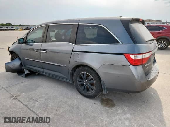 2013 Honda Odyssey EX-L z VIN 5FNRL5H66DB023178, wystawiony jako Copart lot #71291035 z przebiegiem 200 364 mil mil oraz Szkoda całkowita • Salvage title. Historia ofert i sprzedaży dostępna na DreamBid. Obrazek 2.