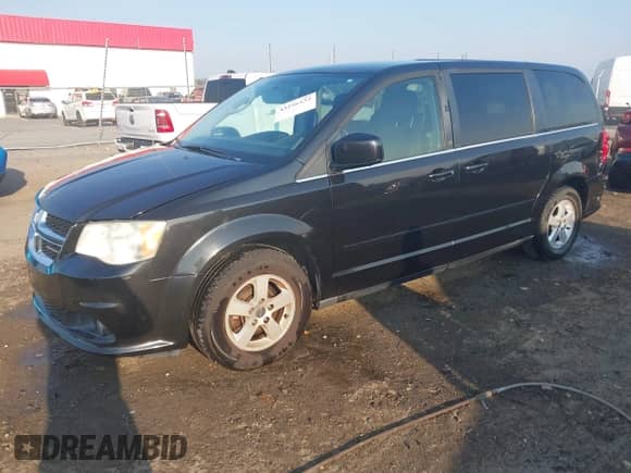 2012 Dodge Grand Caravan Crew z VIN 2C4RDGDG0CR165214, wystawiony jako IAAI lot #43256532 z przebiegiem 96 380 mil mil oraz . Historia ofert i sprzedaży dostępna na DreamBid. Obrazek 19.