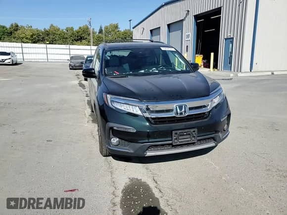 2019 Honda Pilot Touring 8-Passenger z VIN 5FNYF6H9XKB036774, wystawiony jako Copart lot #70208535 z przebiegiem 80 738 mil mil oraz Szkoda całkowita • Salvage title. Historia ofert i sprzedaży dostępna na DreamBid. Obrazek 14.