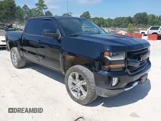2018 Chevrolet Silverado 1500 LT with VIN 3GCUKREC4JG106046, listed as a IAAI auction lot 43215868 with 137,972 mi miles and . Bid and sale history available at DreamBid. Image 1.