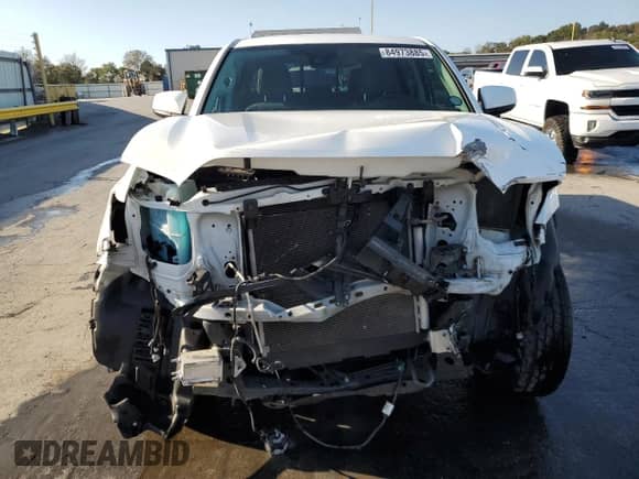 2020 Toyota Tacoma SR with VIN 5TFAX5GN3LX165499, listed as a Copart auction lot 84973885 with 67,043 mi miles and Salvage title. Bid and sale history available at DreamBid. Image 5.
