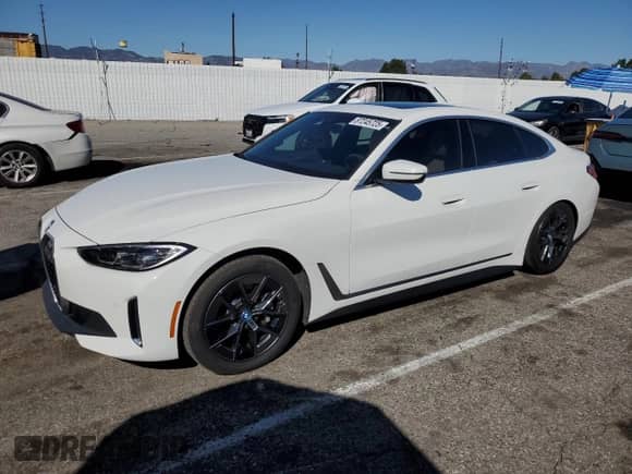 2024 BMW i4 eDrive35 с VIN WBY43AW04RFR59223, выставлен на аукционе Copart как лот 87245725 с пробегом 30 051 миль миль и Списание • Salvage title. История ставок и продаж доступна на DreamBid. Изображение 1.