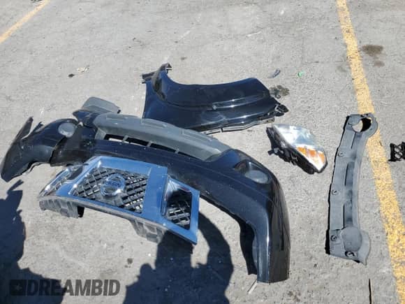 2016 Nissan Frontier SV with VIN 1N6AD0ER8GN736758, listed as a Copart auction lot 80154005 with 104,618 mi miles and Salvage title. Bid and sale history available at DreamBid. Image 12.