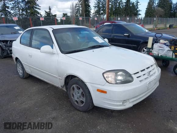 2004 Hyundai Accent GL z VIN KMHCG35C74U303431, wystawiony jako IAAI lot #41725717 z przebiegiem 211 893 mil mil oraz . Historia ofert i sprzedaży dostępna na DreamBid. Obrazek 1.