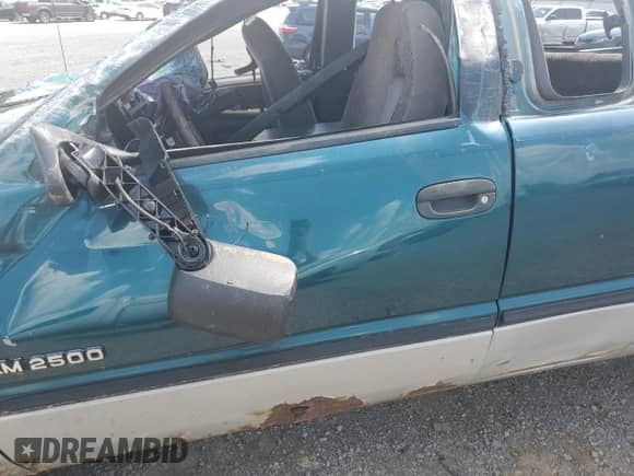 1999 Dodge 2500 with VIN 3B7KF2360XG203981, listed as a Copart auction lot 62489195 with Not provided miles and Salvage title. Bid and sale history available at DreamBid. Image 7.