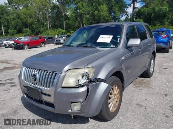 2008 Mercury Mariner Premier with VIN 4M2CU97118KJ53310, listed as a IAAI auction lot 43251176 with 22,170 mi miles and . Bid and sale history available at DreamBid. Image 6.