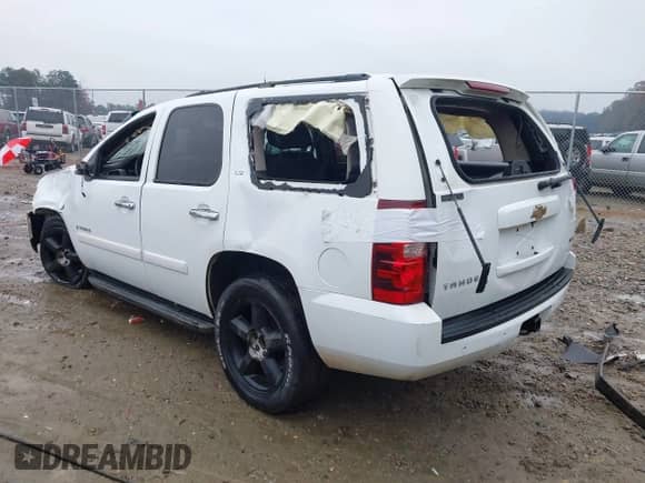 2007 Chevrolet Tahoe LT with VIN 1GNFK13047J385192, listed as a IAAI auction lot 41036949 with Not provided miles and . Bid and sale history available at DreamBid. Image 3.