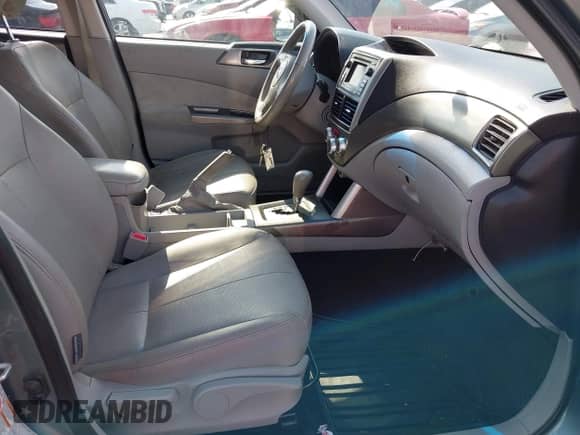 2012 Subaru Forester X Limited z VIN JF2SHBEC0CH420297, wystawiony jako IAAI lot #42468792 z przebiegiem 170 820 mil mil oraz . Historia ofert i sprzedaży dostępna na DreamBid. Obrazek 5.