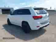 2015 Jeep Grand Cherokee SRT z VIN 1C4RJFDJ4FC182206, wystawiony jako IAAI lot #42431139 z przebiegiem 99 498 mil mil oraz . Historia ofert i sprzedaży dostępna na DreamBid. Obrazek 3.