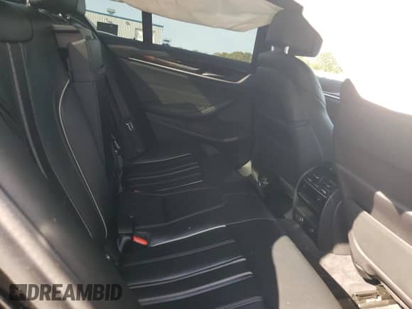 2019 BMW 5 Series 530e xDrive z VIN WBAJB1C5XKB376818, wystawiony jako Copart lot #74683034 z przebiegiem 108 066 mil mil oraz Szkoda całkowita • Salvage title. Historia ofert i sprzedaży dostępna na DreamBid. Obrazek 10.