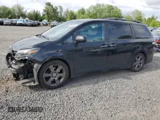 2015 Toyota Sienna SE with VIN 5TDXK3DC8FS650103, listed as a Copart auction lot 60103575 with 124,484 mi miles and Salvage title. Bid and sale history available at DreamBid. Image 1.