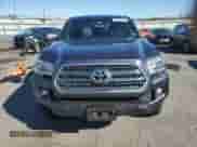 2016 Toyota Tacoma TRD Off Road with VIN 3TMCZ5AN2GM006271, listed as a Copart auction lot 87053715 with 92,101 mi miles and Salvage title. Bid and sale history available at DreamBid. Image 5.